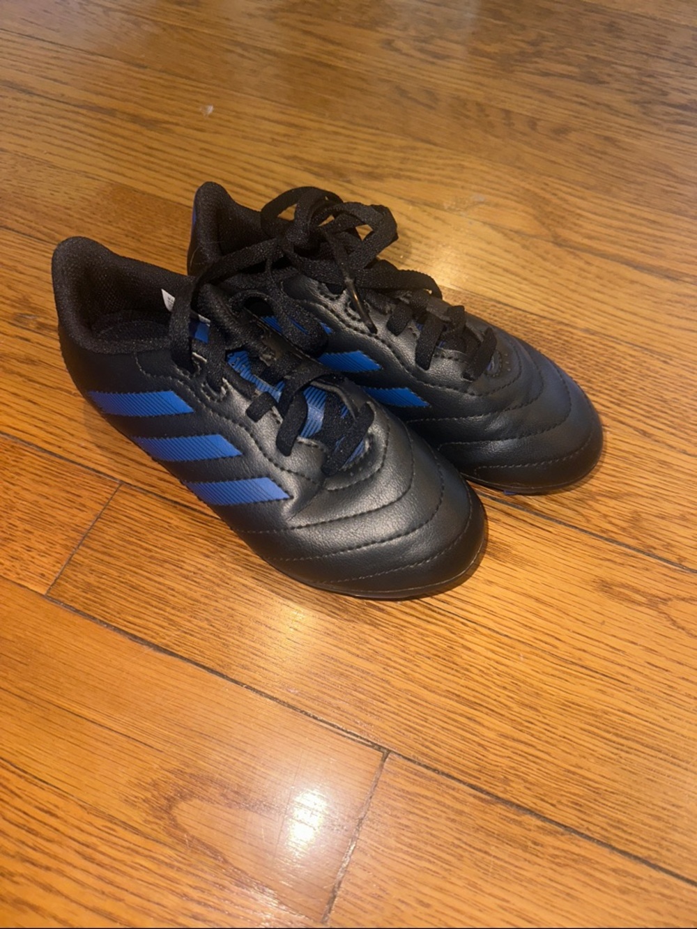 Kids size 12.5 adidas cleats black and blue - like new